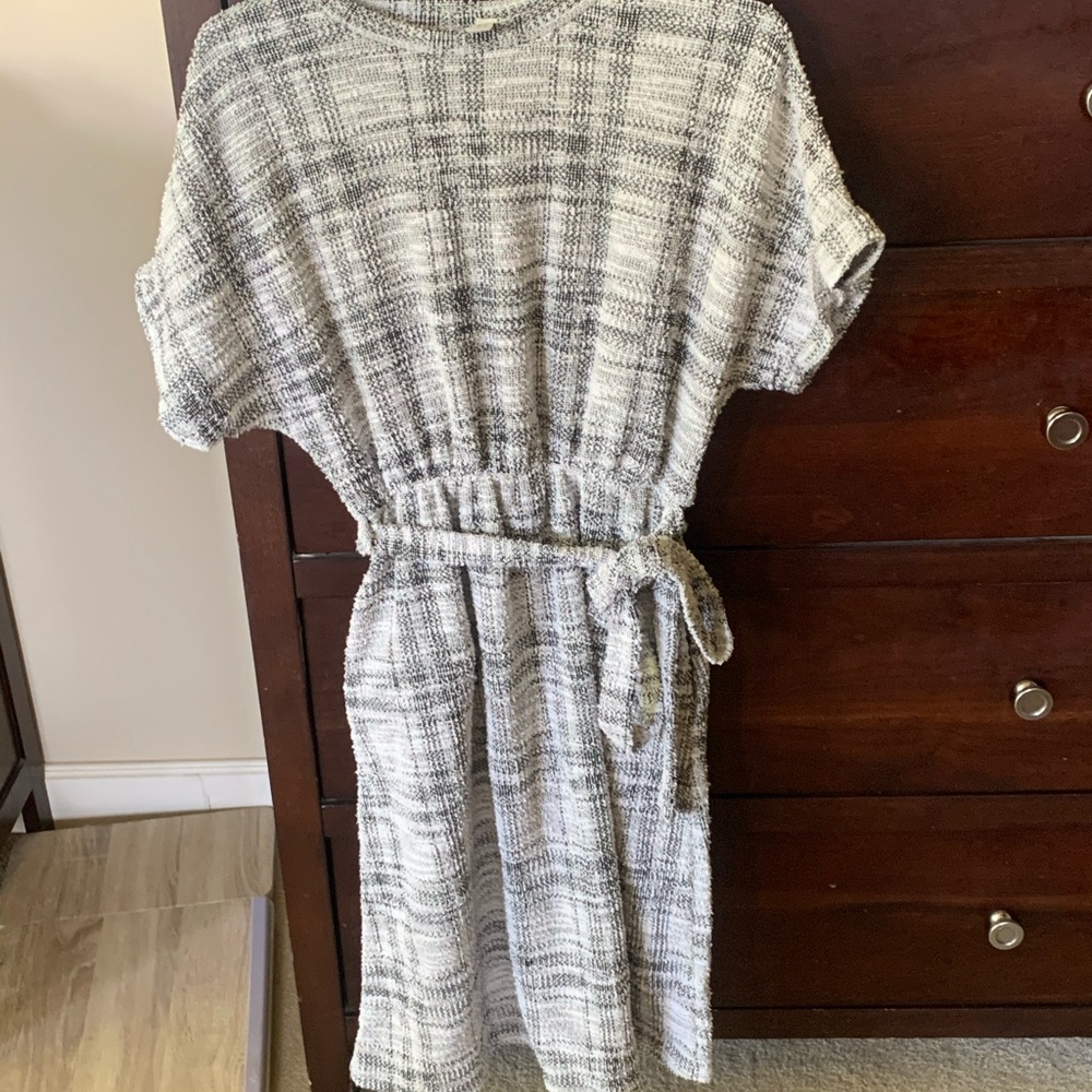 Women’s boucle dress with pockets.